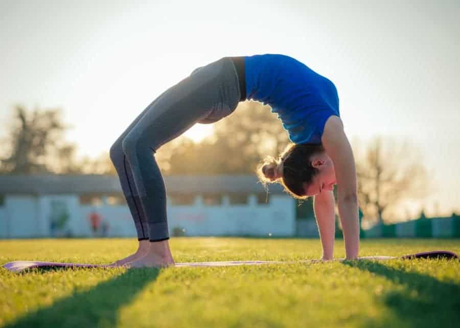 Chakrasana Yoga: Steps & Benefits of the Wheel Pose | FITPASS